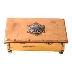  Arts & Crafts copper and enamel box, of rectangular form, the hinged lid with central enamel cabochon overlaid with pierced copper butterfly motif, raised on brass bun feet, H7cm, L17cm