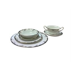  Wedgwood Chartley pattern dinner service for six, including dinner plates, dessert plates, six twin handled soup bowls etc, together with a near matching teapot