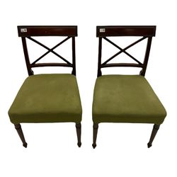Pair George III mahogany chairs, moulded rectangular cresting rail over x framed back, upholstered seats, turned front supports (W49cm), pair William IV mahogany chairs, with scrolled carved middle rails, upholstered drop in seats, on turned supports (W51cm), and an Edwardian mahogany oval wall mirror with bevelled plate