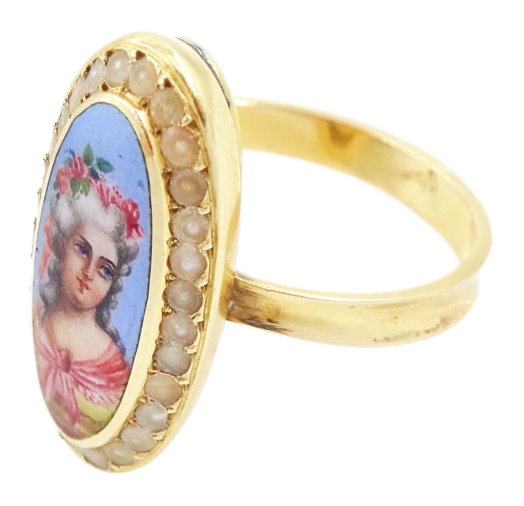 19th century French gold pearl and enamel portrait ring, set with an oval hand painted enamel portrait of a woman wearing a pink shawl and flowers in her hair, surrounded by seed pearls