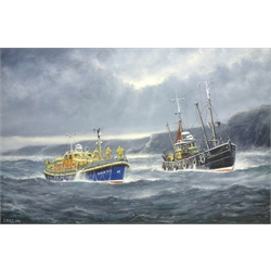  Jack Rigg (British 1927-): Whitby Lifeboat and a Trawler off the Coast, oil on board signed and dated 2004,  50cm x 75cm  DDS - Artist's resale rights may apply to this lot    