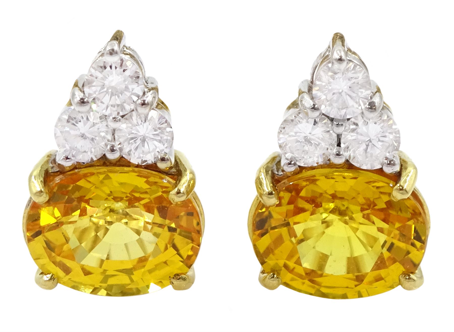 Pair of 18ct white and yellow gold round brilliant cut diamond and oval cut yellow sapphire earrings, total sapphire weight approx 5.40 carat, total diamond weight approx 0.65 carat