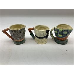 John Beswick figure of a seated piglet, Beswick Beatrix Potter Mrs Rabbit and Peter figure, and quantity of Sandland Character Ware jugs