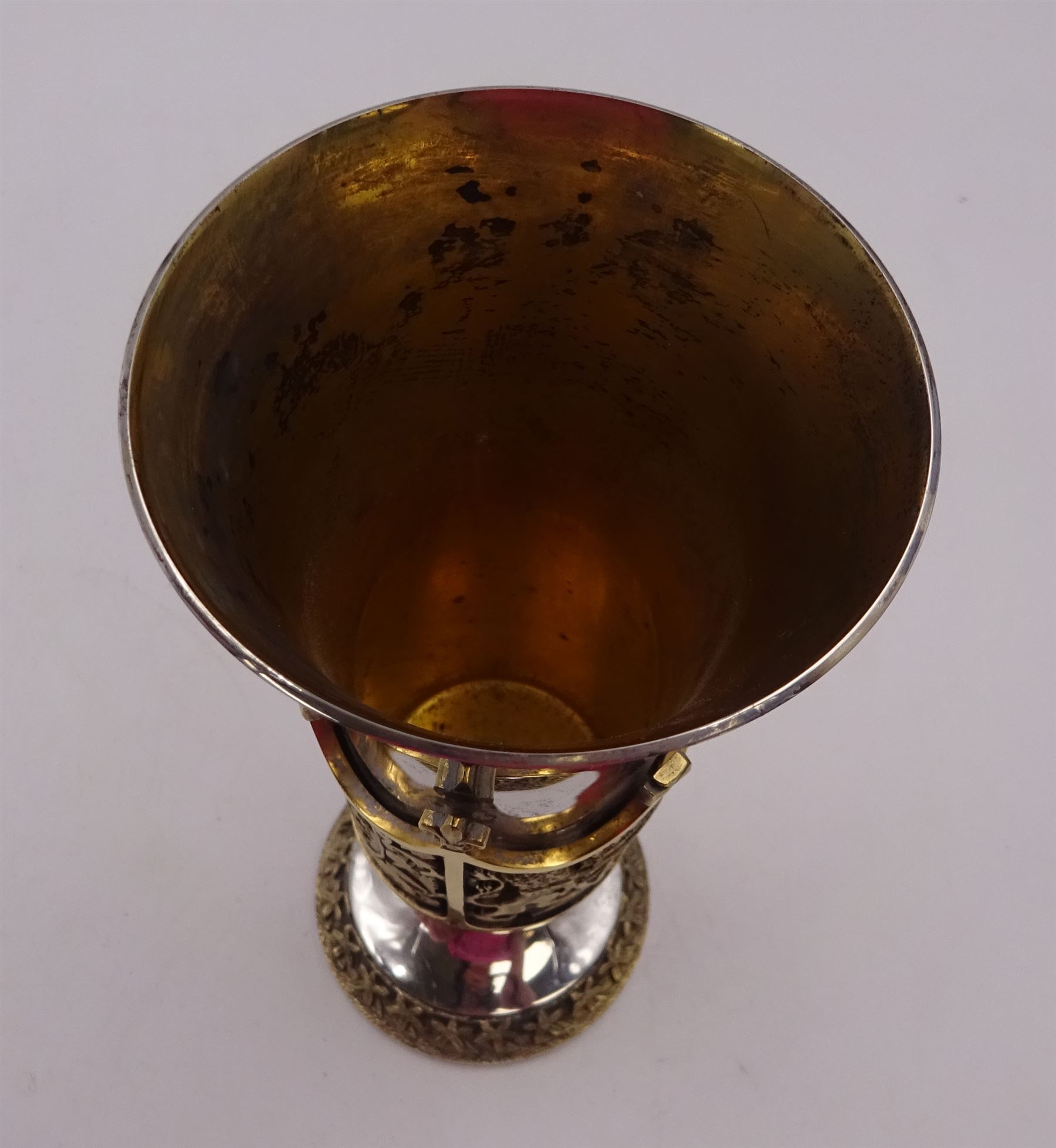 Modern limited edition silver Westminster Abbey Royal Wedding goblet, commemorating the marriage of HRH Prince Andrew and Miss Sarah Ferguson on the 23rd of July 1986, designed by Hector Miller for Aurum, the tapering cylindrical bowl with gilt interior and parcel gilt pierced band to base depicting the Royal Arms, upon knopped stem and circular stepped foot with floral parcel gilt rim, no. 483/750,  hallmarked Hector Miller, London 1986, H17cm