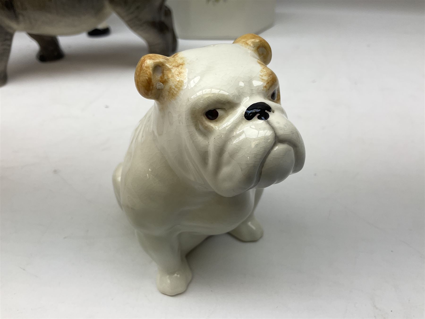 Beswick model of a seated bulldog, model no. 1872, Beswick Laurel & Hardy cruet set on stand, no. 575, Melba Ware animal figures to include large horse, hippo, rhino, USSR tiger cub figure, other ceramics to include Mason's lidded jar etc