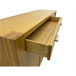 Light oak sideboard, fitted with three drawers and three cupboards