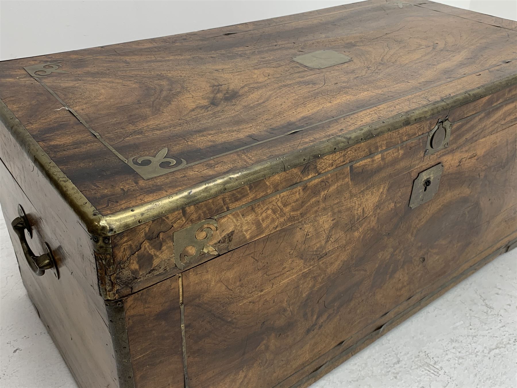 19th century brass bound camphor wood campaign chest, with decorative brass inlays and carrying handles, W91cm, H41cm, D46cm