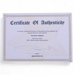 Four Sylvester Stallone film stills and promotional shots, including one depicting Rocky Balboa in the ring, three signed by Sylvester Stallone and one signed by Brigette Nielsen, all with certificates of authenticity