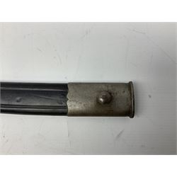 Turkish Model 1874 sword bayonet with 57.5cm curving steel fullered blade and chequered black grip, in steel mounted leather scabbard L75.5cm overall