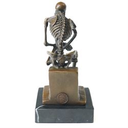 Bronze skeleton modelled as 'The Thinker', on black marble base, signed 'Milo' to plinth, H14cm