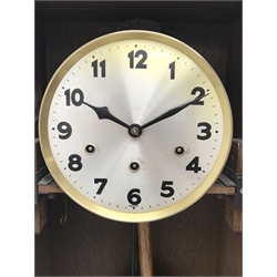  20th century oak wall clock, silvered Arabic dial with glazed door, three train movement chiming the quarters on rods, H79cm    