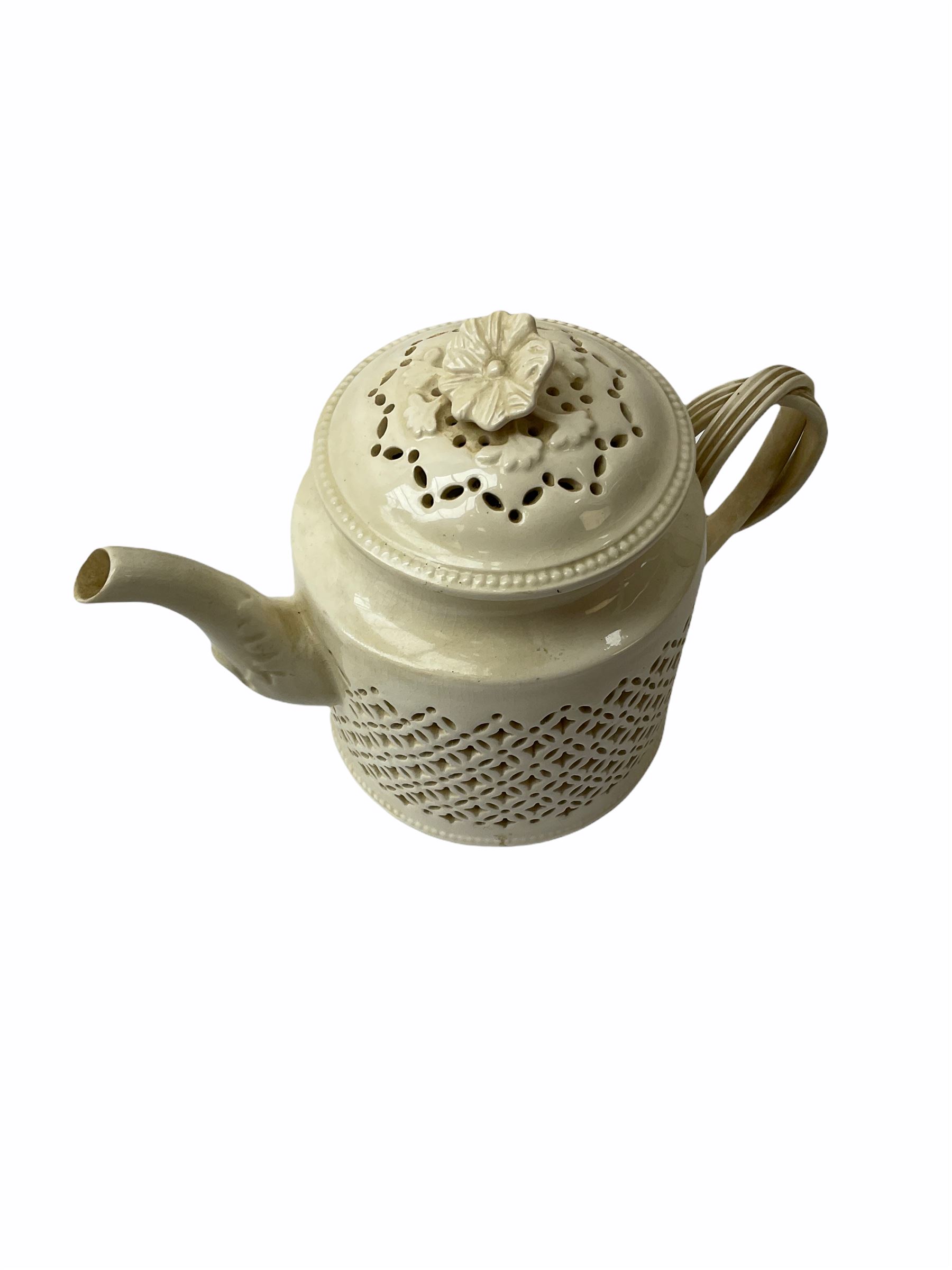 20th century Leeds creamware, comprising chestnut basket and stand, small tureen and cover, ladle, and associated stand, candlestick with stem modelled as a dolphin, teapot, tureen and cover in the form of a melon with fixed stand, and toast rack (toast rack a/f), each with impressed mark beneath. 