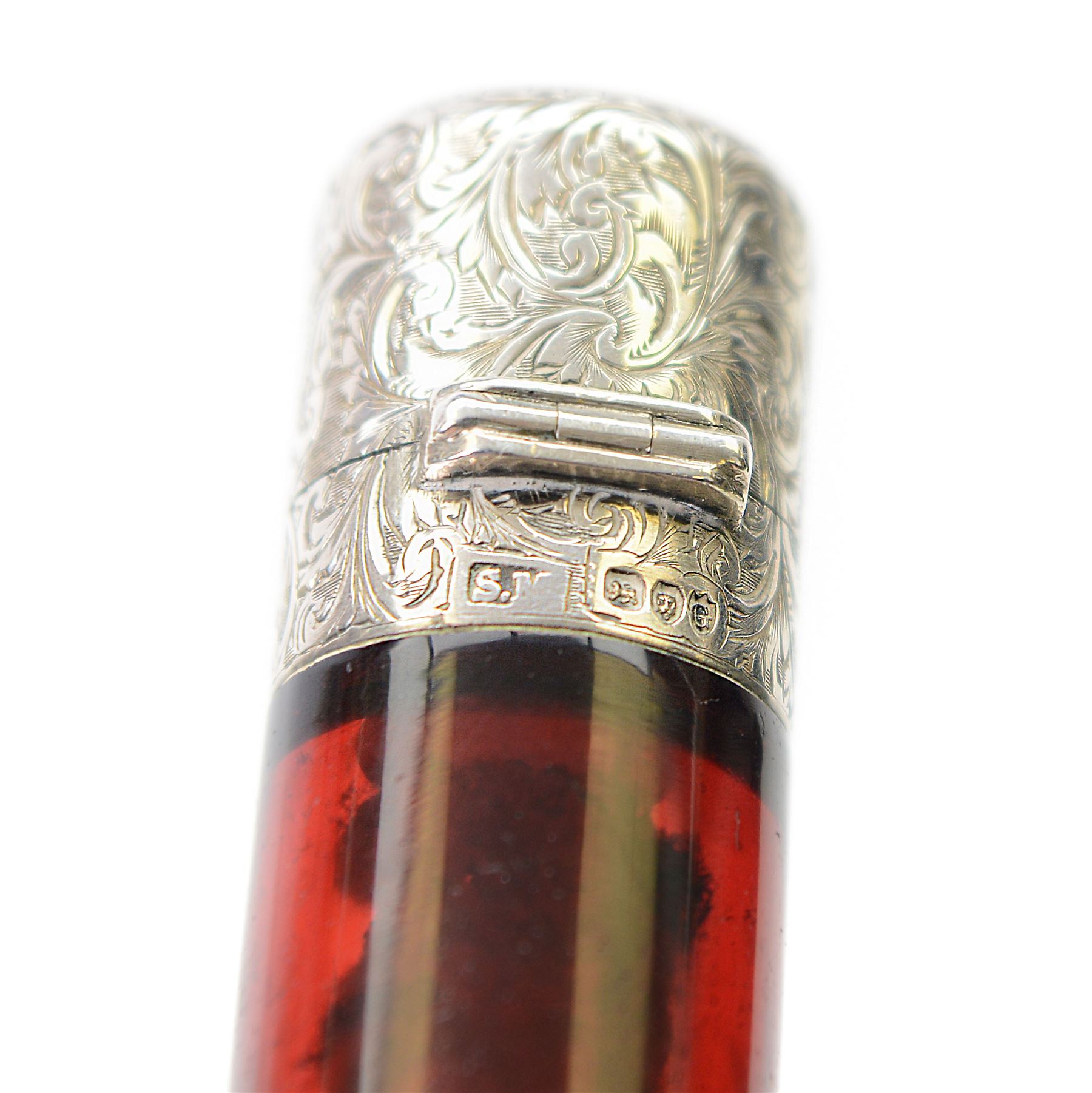 Victorian silver mounted red glass double scent bottle, with silver caps to both ends, engraved with bright cut scrolling decoration, hallmarked Sampson Mordan, London 1882, L10cm