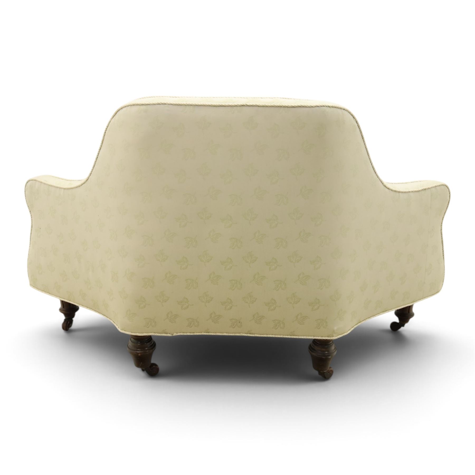Victorian mahogany frame parlour settee, in back-buttoned ivory fabric