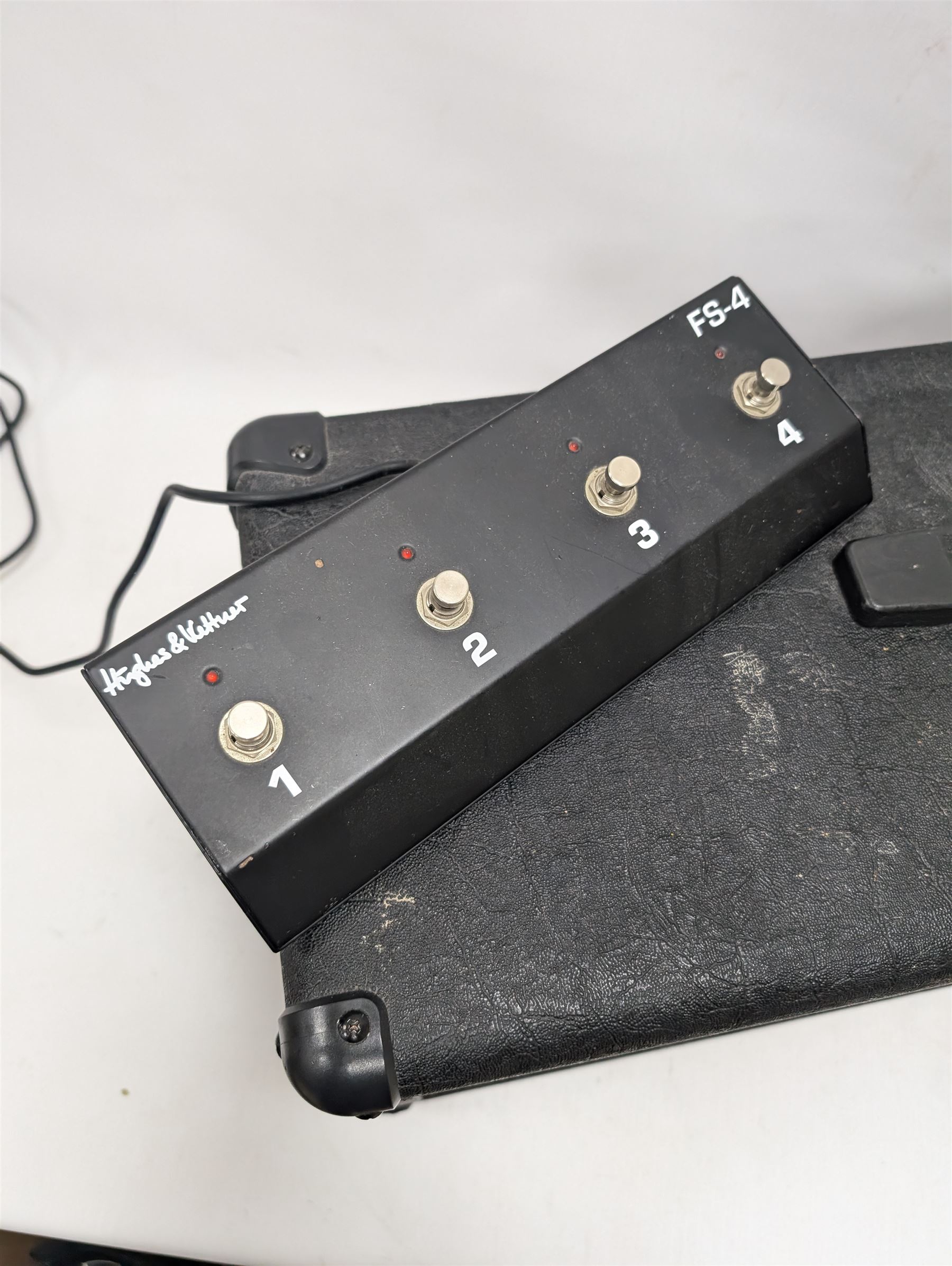 Hughes & Kettner Attax 100 guitar amplifier head, serial no. A01-1221-20301900, together with a Hughes & Kettner FS-4 four-button foot pedal, head H27cm, W69cm