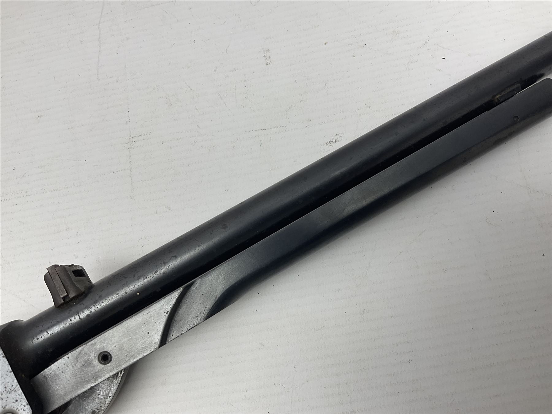 Early 20th century BSA Standard .177 Cal. Air Rifle (No.1), early A prefix number A67, with blued finish, top-loading, push-button underlever action, walnut semi-pistol grip stock with chequered BSA logo L101cm overall; with contemporary canvas case; NB: AGE RESTRICTIONS APPLY TO THE PURCHASE OF AIR WEAPONS.