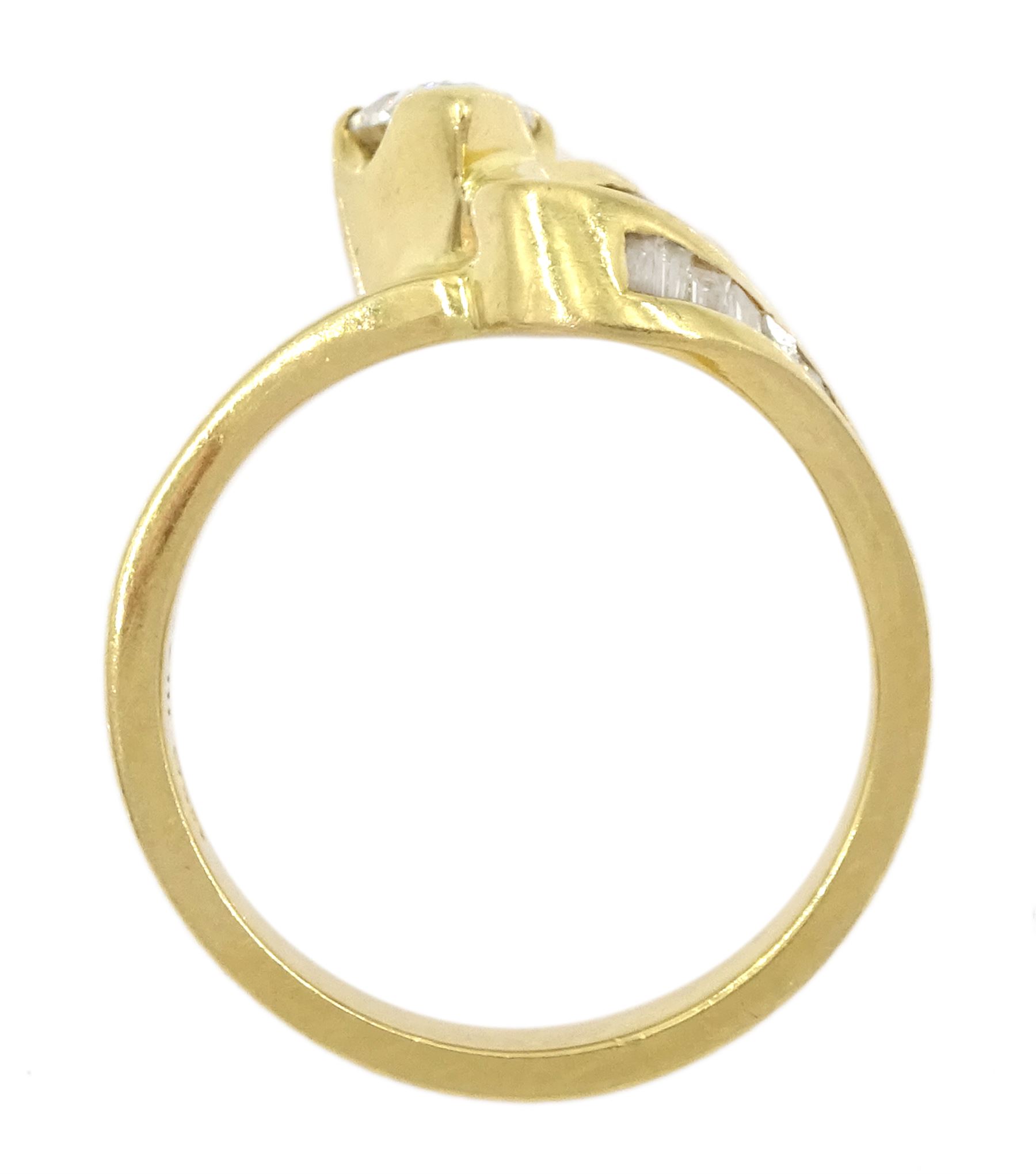 18ct gold diamond pear and baguette cut diamond ring, stamped 750, principle pear cut diamond of approx 0.75 carat, total diamond weight approx 1.25 carat
