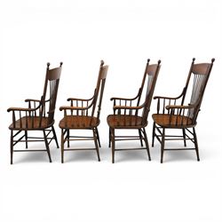 Set of eight 19th century ash and elm spindle back Windsor armchairs, arched top rails above fan-shaped spindle backs, curved arms with turned supports, shaped saddle seats, on turned legs joined by H-stretchers