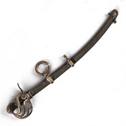 Continental silver miniature, in the form of a Light Cavalry sword, circa 1920, with a gold plated hilt, L3cm
