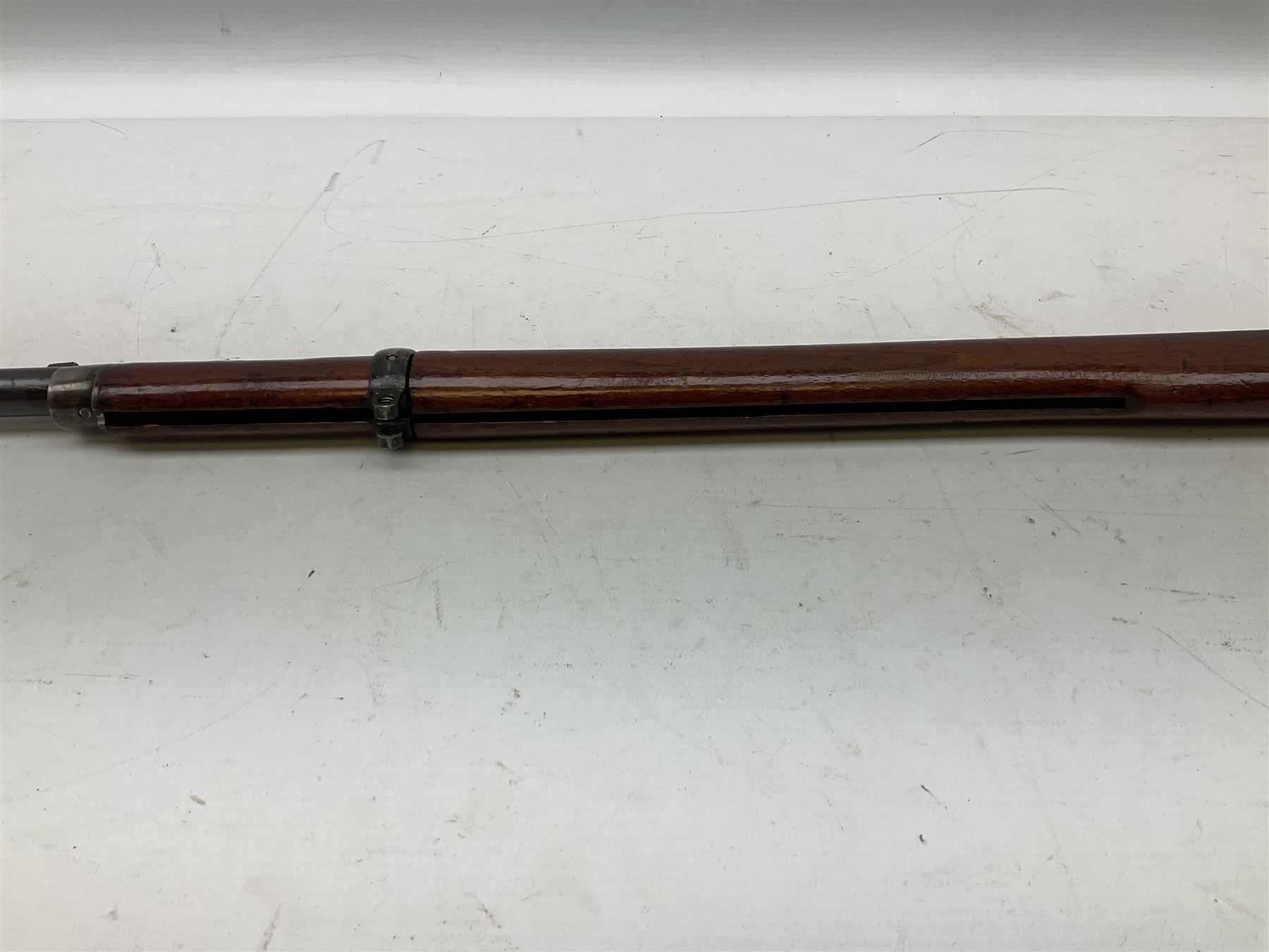 Westley Richards .310 Cadet Martini action rifle, the 63.5cm smooth bored barrel with one barrel band, walnut stock stamped 93/352 with hinged compartment to butt, serial no.3365, L103cm