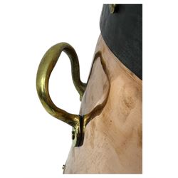 20th century copper milk churn, of tapering cylindrical form with applied brass twin handles and darkened banded rim and base