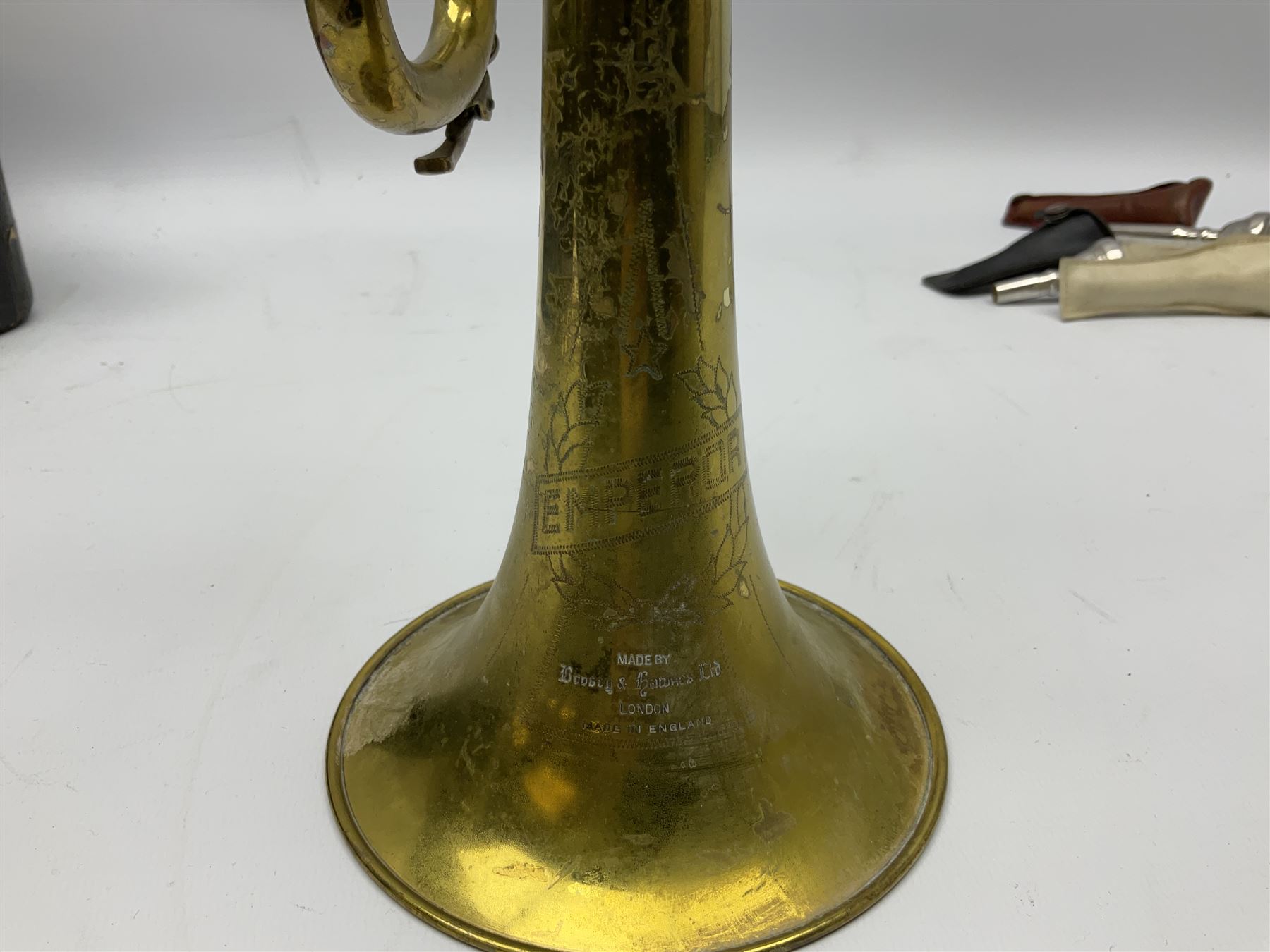 Boosey & Hawkes Emperor brass trumpet L48.5cm; in Henri Selmer carrying case with five mouth pieces and four mutes