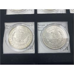 Seven United States of America silver Morgan dollar coins, dated 1884, 1901 O, 1902 O, 1903, 1904 O, 1921 D and 1921
