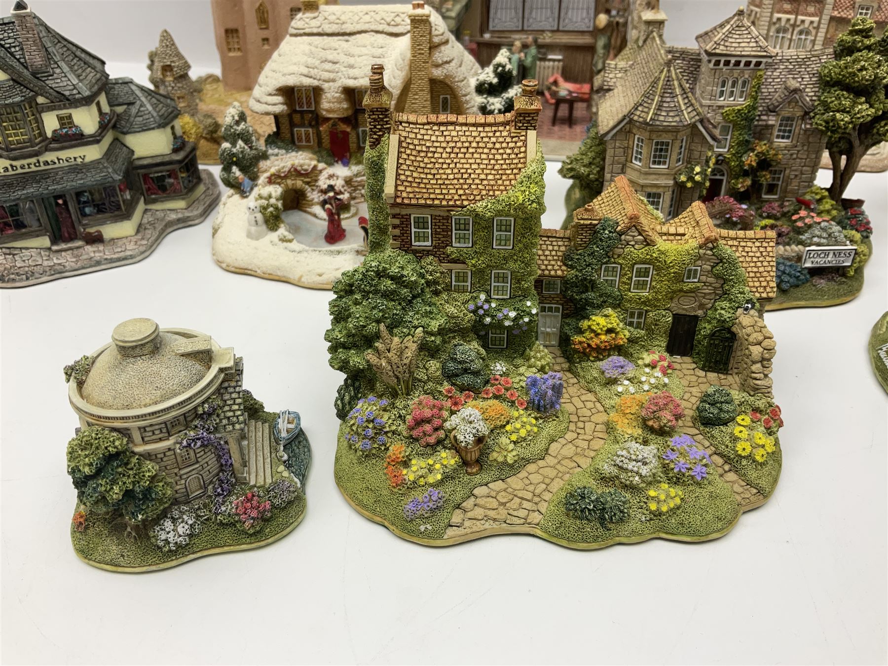 Ten Lilliput Lanes, to include Sleigh Bells, Short Back and Sides, Crook Hall Gardens, Loch Ness Lodge, Le Petit, etc, nine with original boxes  (10)