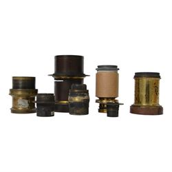 Seven 19th century and later brass camera lenses, including J. Lancaster & Son Rectigraph lens, Watson & Sons 8 1/2 x 6 1/2 lens, Dallmeyer lens and Wray London 5 x 4 lens