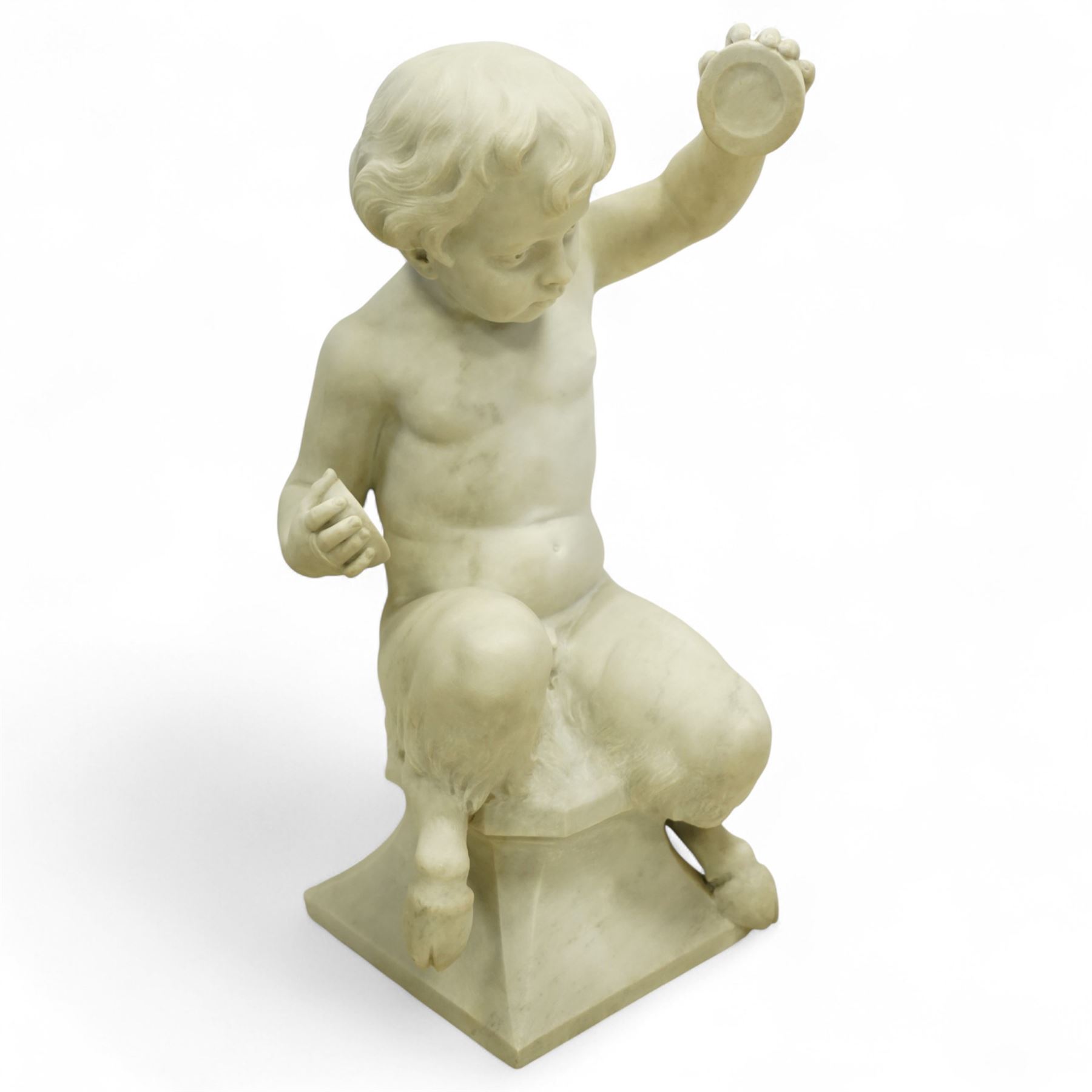 Follower of Claude Michel Clodion (French 1738-1814): The Putti-Faun Orchestra - set of four Italian carved white marble figures of child satyrs as musicians, each finely carved figure depicting a seated putto-faun with youthful features and small goat’s legs and cloven feet, variously playing rustic instruments: a syrinx (Panpipes), a flute, a tambourine and clappers - each raised on an integral waisted square plinth, Italian, circa 1900

Provenance: Kirkham Hall

Notes: Inspired by the rustic god Pan and his followers, these putti-fauns reflect the late-19th-century revival of classical themes popular with Grand Tour collectors; their instruments evoke the god Pan’s pastoral music, while the carving and  composition exemplify the appeal of bacchic subjects in the Italian neoclassical tradition
