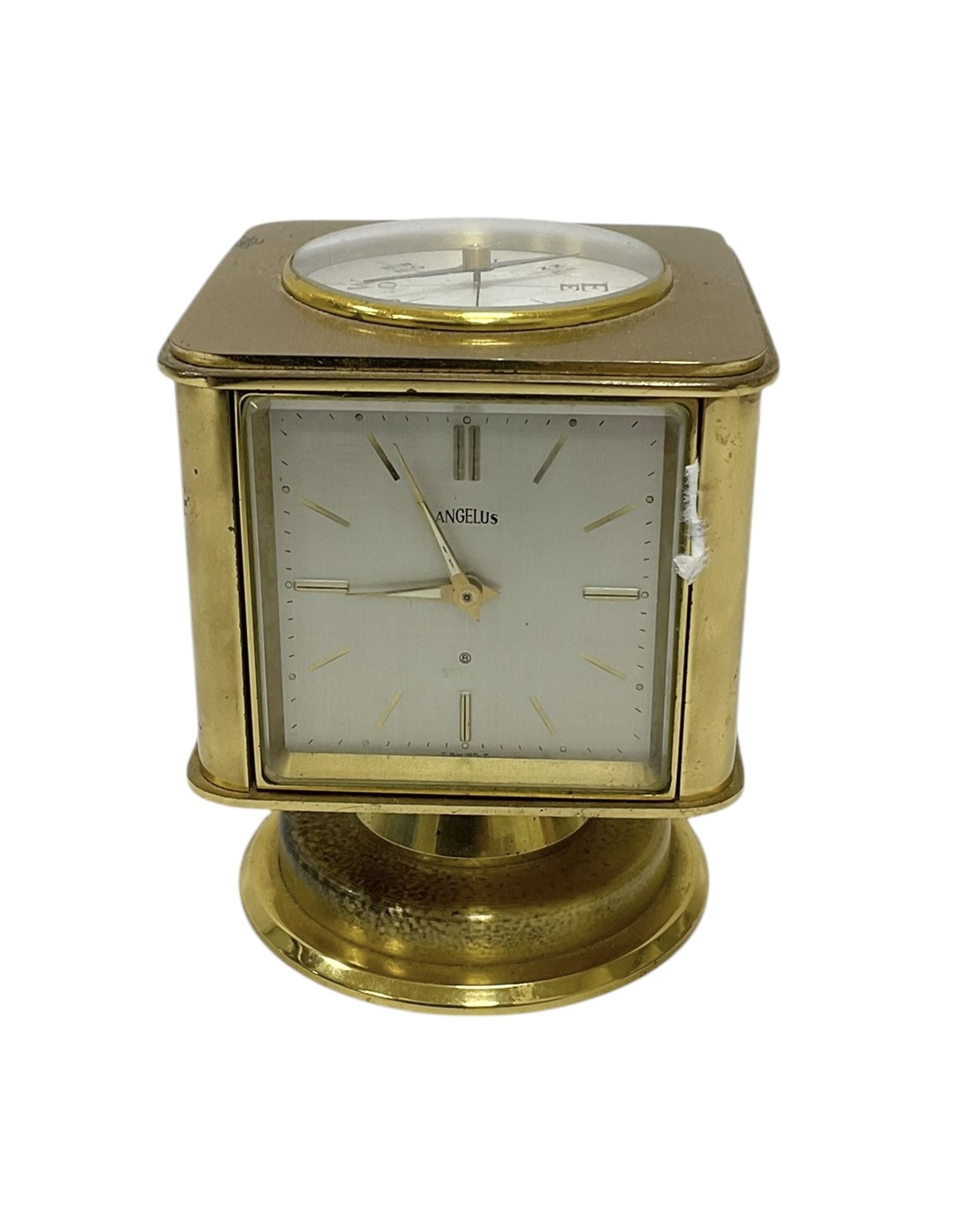 20th century-Angelus clock and weather station combined, in a satin gilt case with an 8-day clock movement, hygrometer, barometer, thermometer and compass.