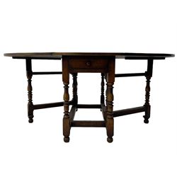 19th century oak dining table, oval drop-leaf top on gate-leg action base, turned supports united by turned stretchers, fitted with single end drawer