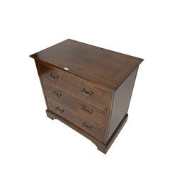 Edwardian mahogany three drawer chest, inlaid with chequered feather bandings, on bracket feet