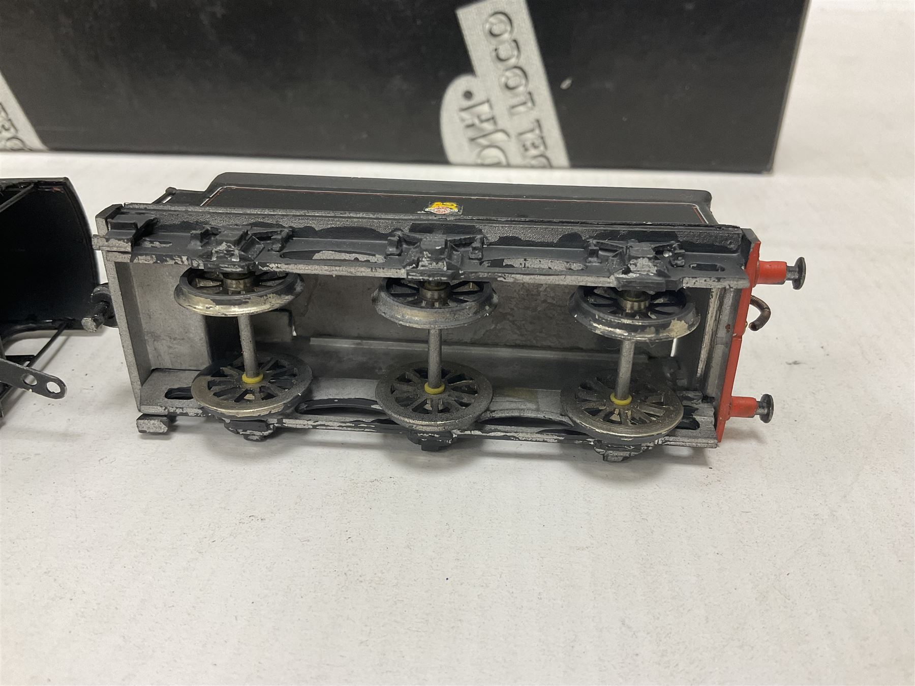 ‘00’ gauge - two kit built steam locomotive and tenders comprising Class 0395 Jumbos 0-6-0 no.30566 finished in BR black; Class C2X Large Vulcans 0-6-0 no.32434 finished in BR black; both with DJH Models boxes (2) 