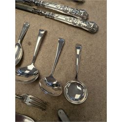Group of silver and silver handled cutlery, including caddy spoons, thimble, propelling pencil, fruit knife, etc, all stamped or hallmarked
