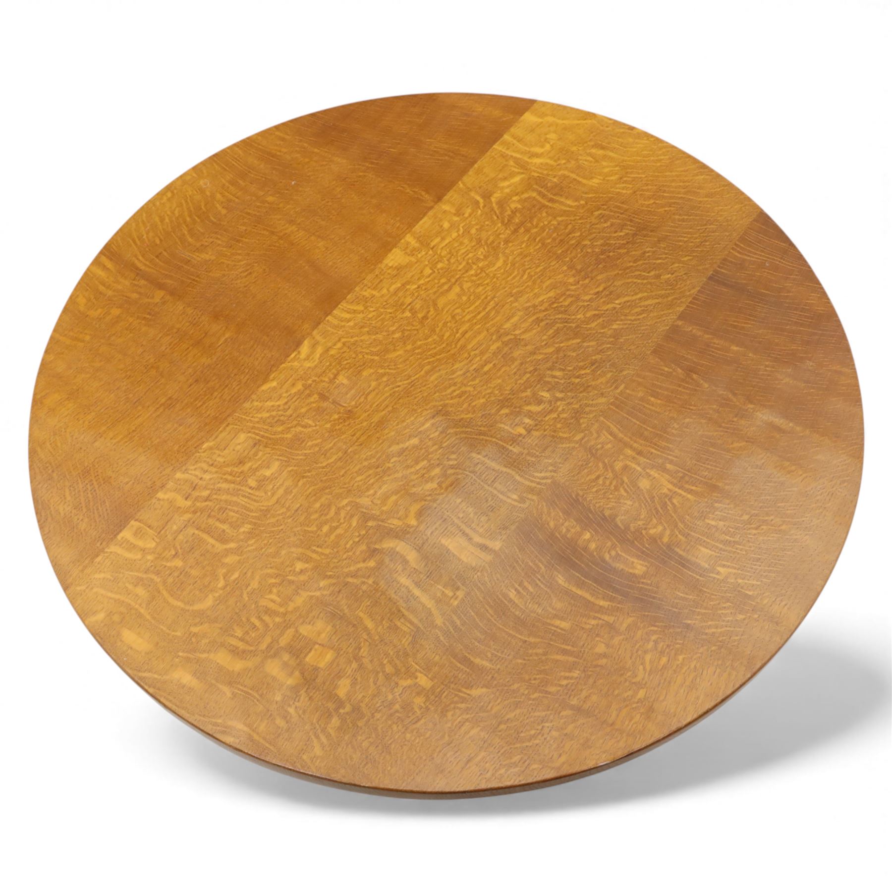 Mouseman - oak coffee table, the circular adzd top over four pillars united by stretchers, with signature mouse carving by Robert Thompson of Kilburn 