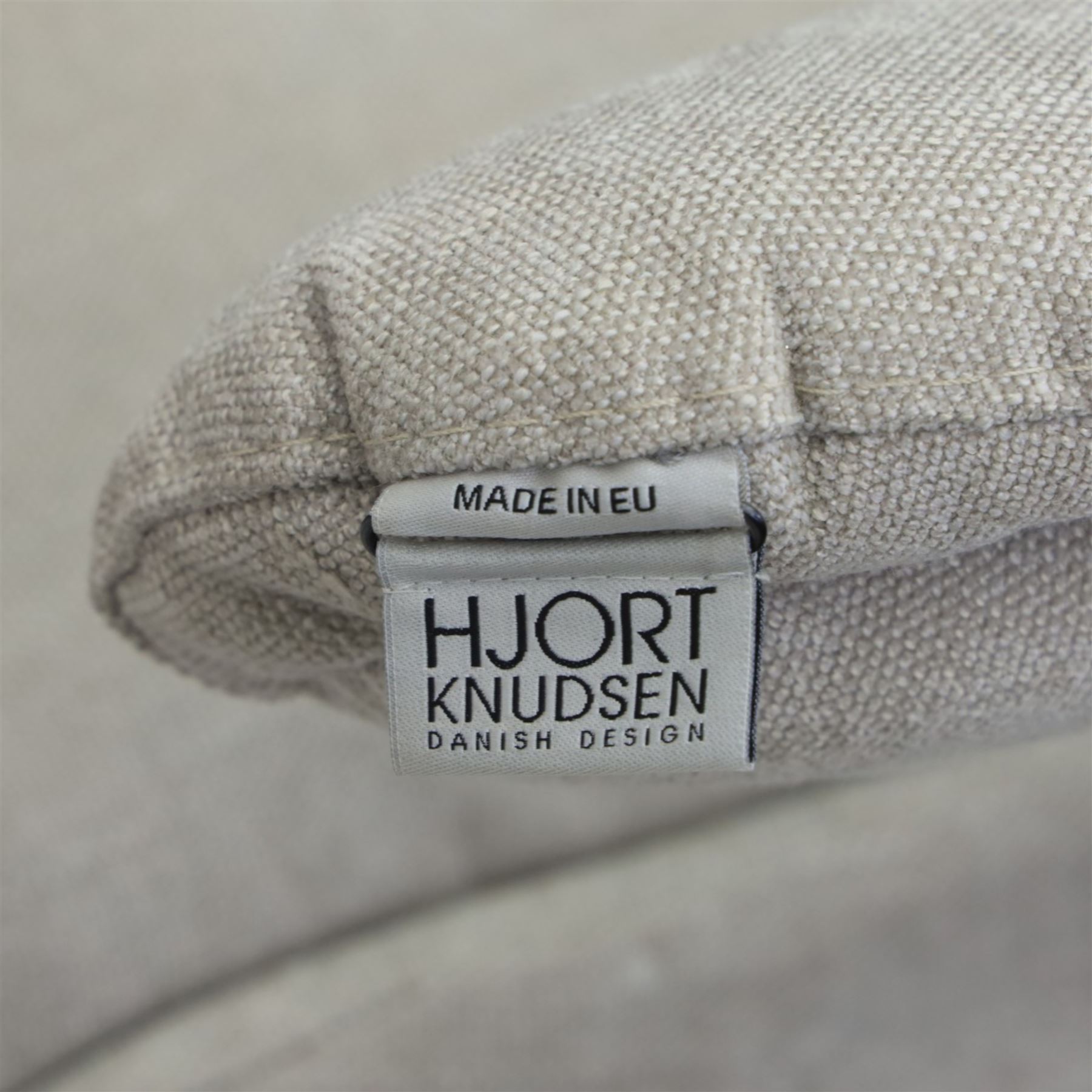 Hjort Knudsen - Danish recliner armchair in neutral upholstery, with manual recline, raised on a metal star base