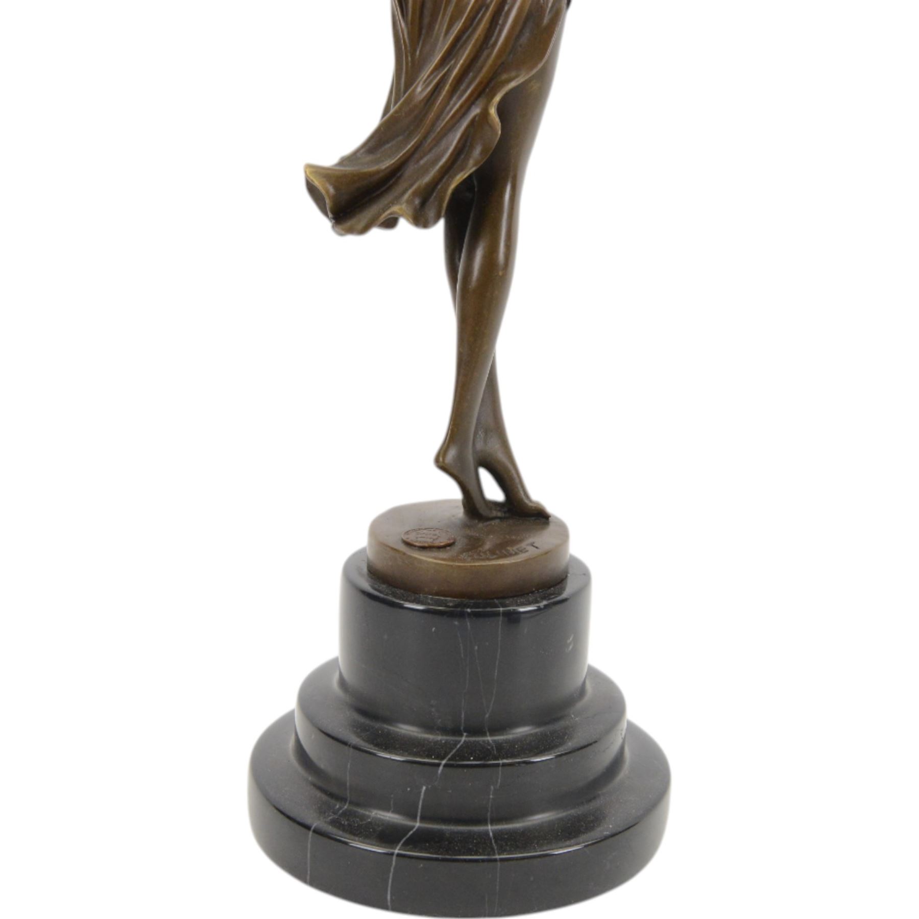 Bronze figure of a female dancers, signed colinet, with foundry mark on a stepped circular base, H41cm