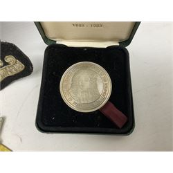 Limited edition Spode Green Howard's twin handled loving mug, no 205/300, with certificates, together with a Green Howards cased Tercentenary medal (1688-1988), cap badge and embroidered patch, largest H11.5cm