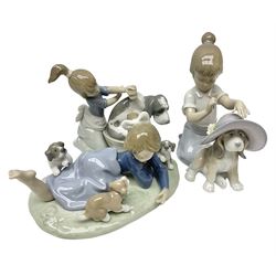 Three Lladro figures, comprising Playful Romp no. 5594, Bashful Bather no. 5455 and Elegant Touch no. 6862, largest H15cm