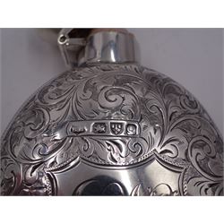 Victorian silver hip flask, of oval form, with engraved foliate and scroll decoration, and monogrammed shield shaped cartouche to centre, with plain collar and cap, H11cm, hallmarked Chester 1899, maker's mark worn and indistinct, together with an Edwardian silver glasses case, of oval form, with engraved foliate and scroll decoration, and monogrammed circular shaped cartouche to centre, with opening to top, revealing velvet lined interior, with silver shield clip, H17.5cm hallmarked to case and clip Sanders & Hill,  Birmingham 1908, with a pair of gold plated glasses 