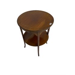 Edwardian inlaid mahogany circular two-tier occasional table, satinwood stringing on sabre supports