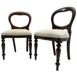 Pair of Victorian design mahogany bedroom chairs, balloon back over overstuffed seats upholstered in ivory fabric, on turned supports