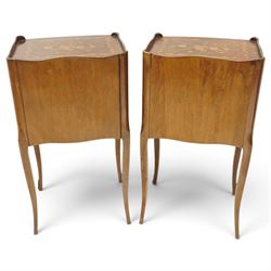 Matched pair of French inlaid floral marquetry bedsides, the three-quarter gallery tray top with central floral bouquet inlay and C-scroll border, one fitted with single frieze drawer over recessed cupboard and shaped apron, the other with three drawers, raised on tapering cabriole supports, with brass cartouche feet