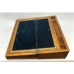 A Victorian walnut and brass banded writing slope, the hinged cover with vacant brass cartouche, opening to reveal a plush lined slop and compartmented interior, H17.5cm L50cm.