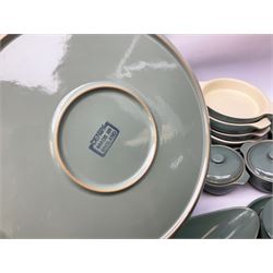 Denby Manor Green pattern part tea and dinner service, to include seven dinner plates, thirteen side plates, ten dessert plates, two oval dishes of various sizes, four cups and saucers, seven bowls with covers, two teapots etc (74)  