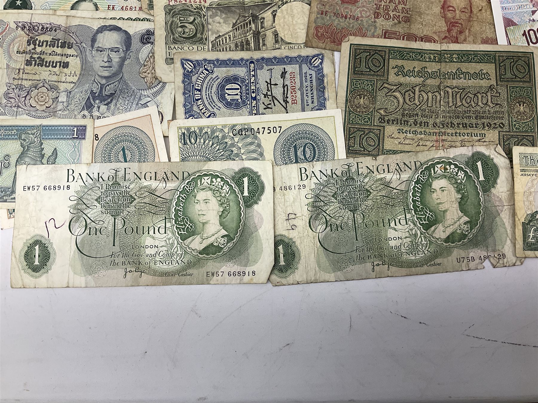 Great British and World banknotes, including Bank of England Page one pound 'EW57', Forde ten shillings 'C41N', various Belgian and Scottish notes etc