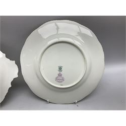 Coalport green batwing pattern tea wares, decorated with finely enamelled floral sprays within gilt reserves, comprising teacup trio, twin handled cake plate and side plate, pattern no Y2665, together with a Coalport for Harrods cup and saucer similarly decorated, the saucer with stamped mark beneath 'Manufactured for Harrods Ltd, Brompton Rd London', all with green Coalport AD 1750 marks beneath, largest W31cm (7)