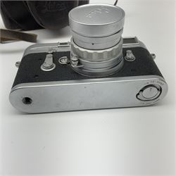 Leica M3 camera body, 1959, chrome finish, serial number '986937', fitted with 'Ernst Leitz GmbH Wetzlar Summicron f=5cm 1:2 Nr.1592614' lens, with Leica M3 instruction booklet