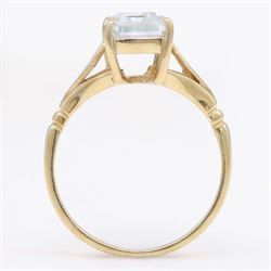 Early - mid 20th century gold aquamarine ring, four claw set with a single emerald cut aquamarine of approx 1.40 carat, stamped 18ct